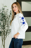 PREORDER: Machine Embroidered Details Ruffle Neck Blouse