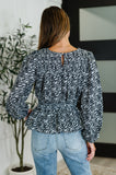 Muse Moves High Neck Peplum Blouse in Black