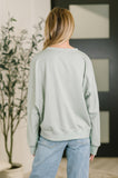 Petal Poise Floral Applique Pullover in Ivy